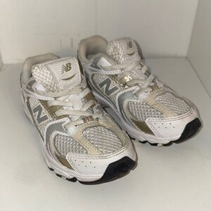 New Balance Kids White and Gold Sneakers